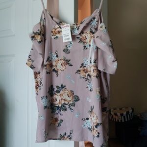 Peekaboo shoulder shirt.